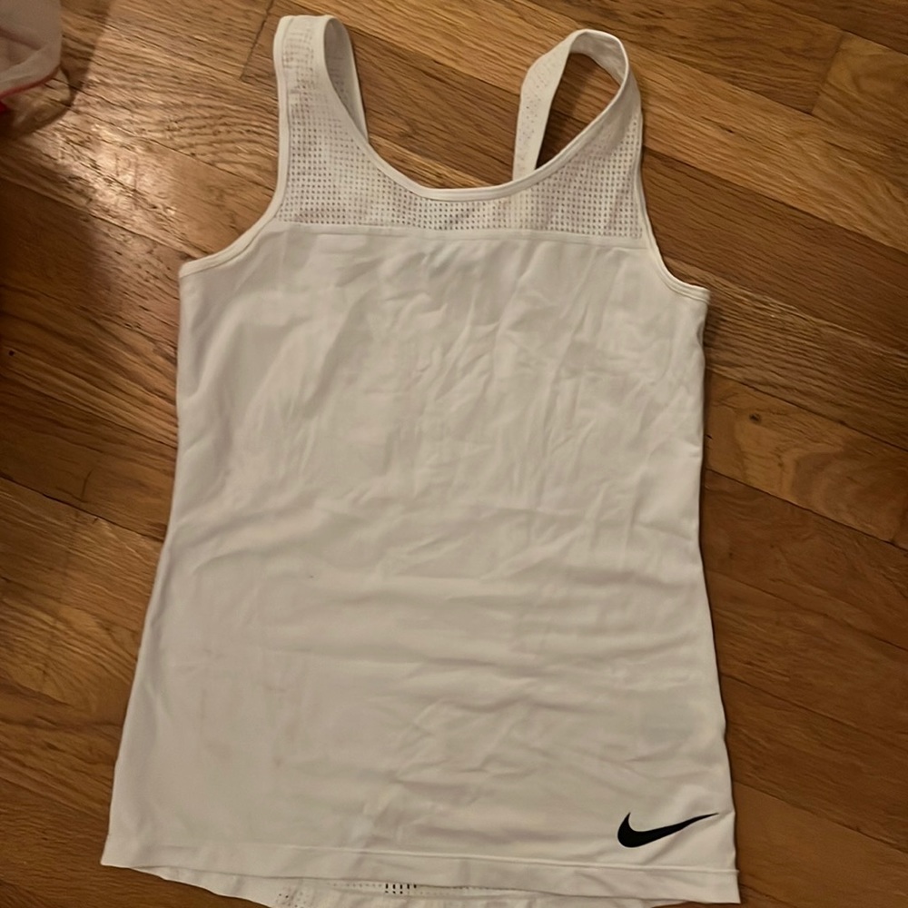 White Nike workout top. Slits in back, make it cooler in temp. Perfect condition